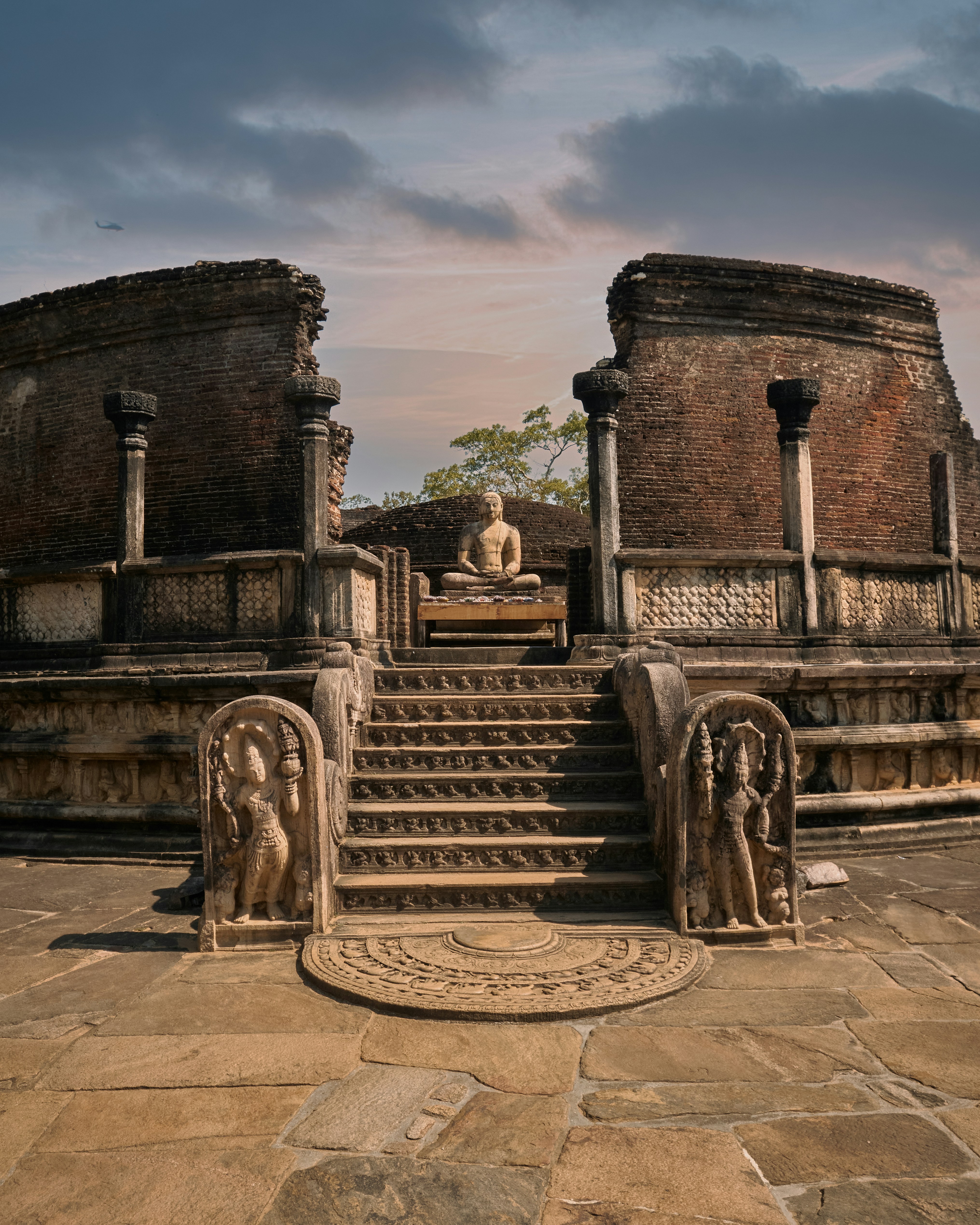 Ancient stone ruins at a Sri Lankan cultural heritage site, part of the island's UNESCO World Heritage circuit