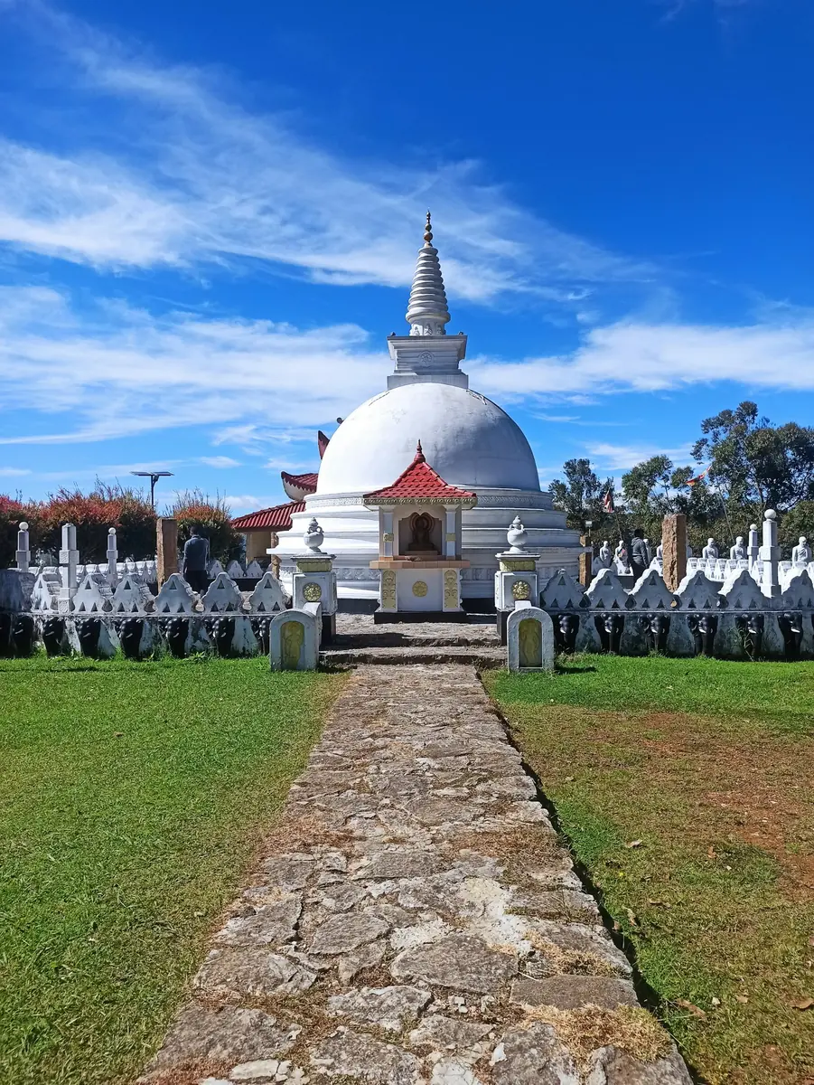Stone steps leading up the forested hillside to the Ambasthala dagoba at Mihintale, Sri Lanka, where Buddhism was introduced to the island