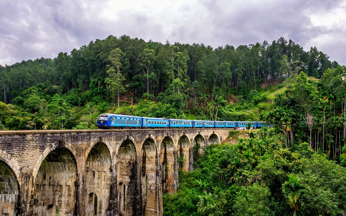 The famous Nine Arch Bridge in Ella, Sri Lanka, surrounded by dense green jungle and tea estates