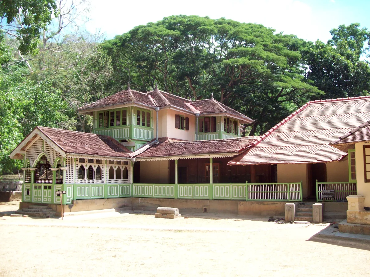 Maduwanwela Walawwa - the 300-year-old royal manor house in Kolonna, Sri Lanka, with its distinctive green-painted wooden verandas and terracotta tiled roof