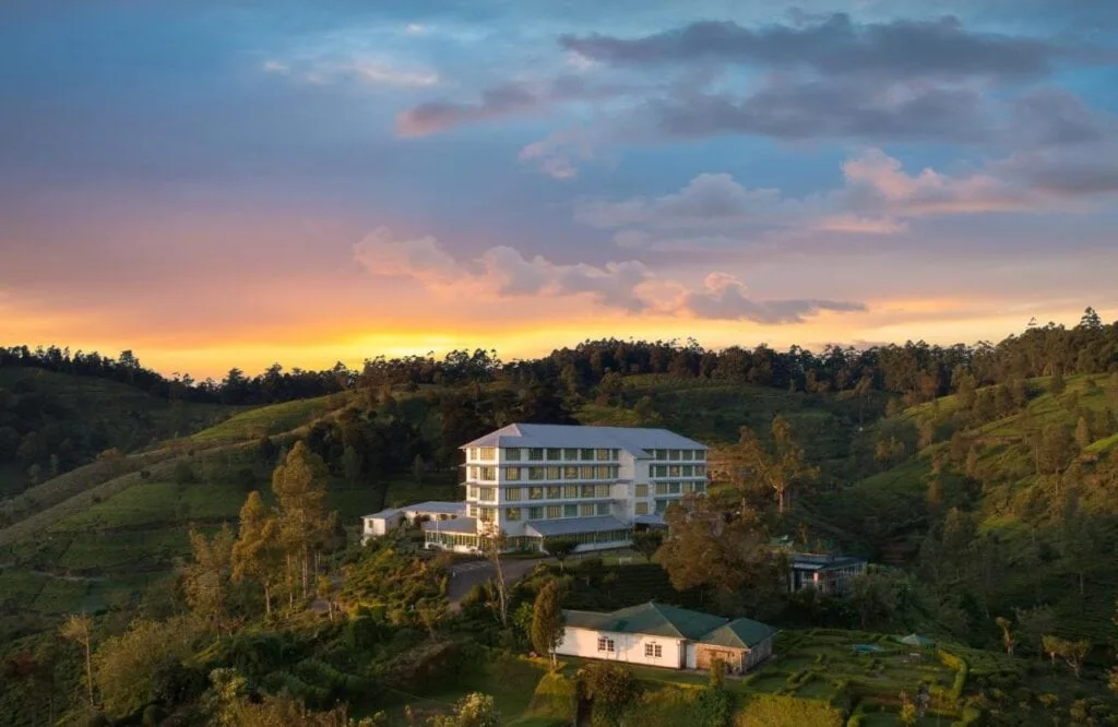 Heritance Tea Factory hotel in Nuwara Eliya, Sri Lanka - luxury boutique hotel converted from a historic working tea factory surrounded by misty tea plantations