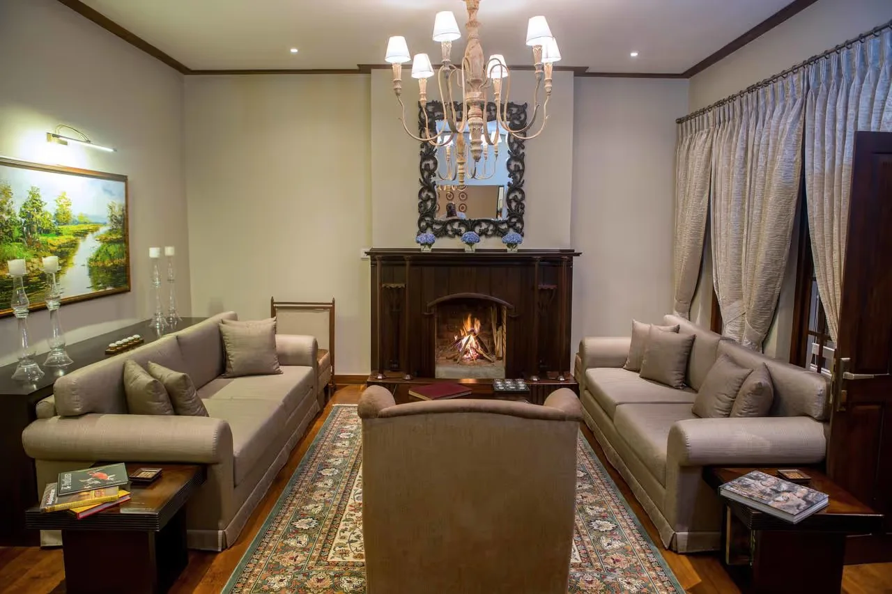 Stafford Bungalow in Nuwara Eliya, Sri Lanka - luxury colonial plantation bungalow surrounded by tea fields with an open wood fire and champagne on arrival