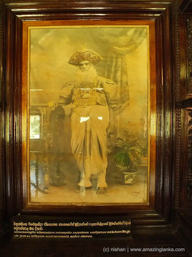 Framed portrait of Sir James William Maduwanwela Maha Disawa in full Kandyan chieftain regalia, photographed in the early 1900s