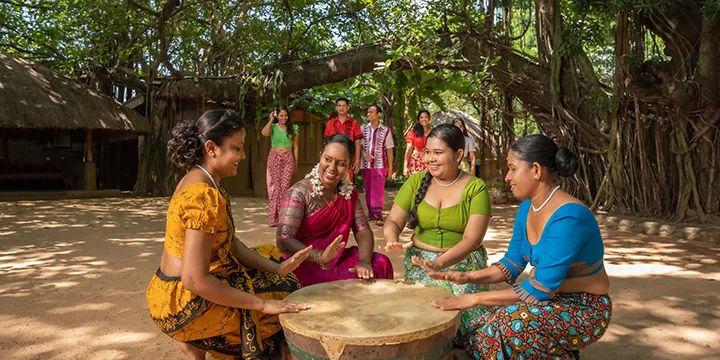 Sri Lankan community gathering for Avurudu New Year celebrations with colourful decorations and traditional dress